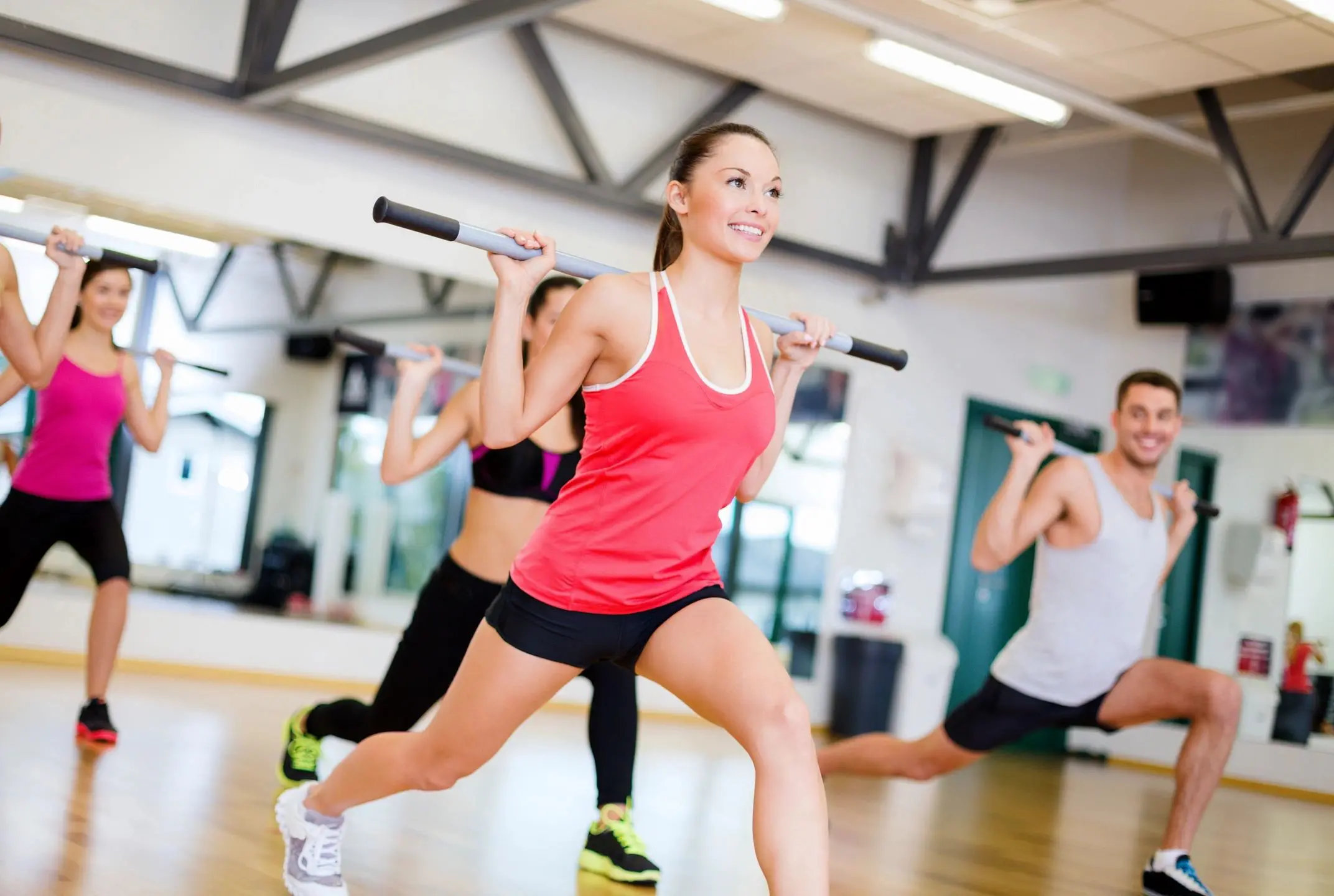 fm=f_8731 A group of people in the gym doing exercises.
