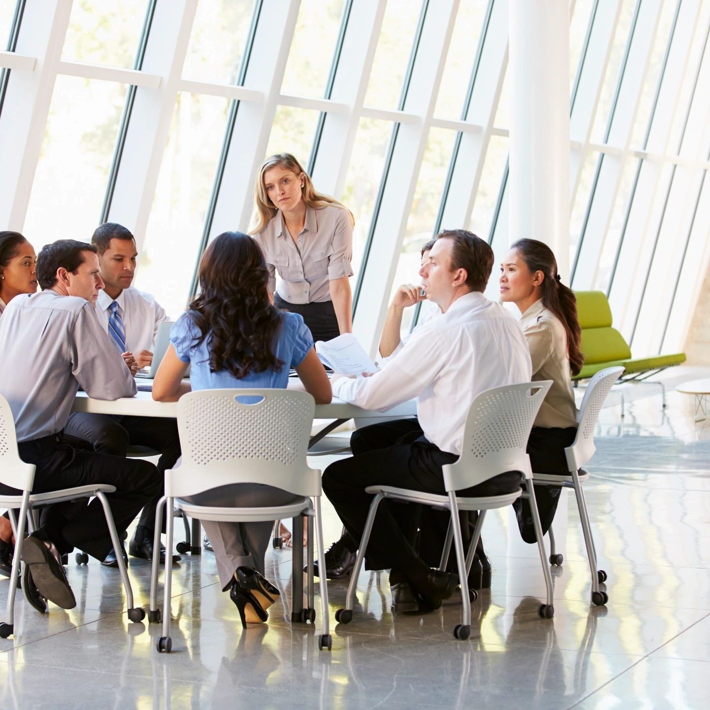 fm=f_59696 A group of people sitting around a table.